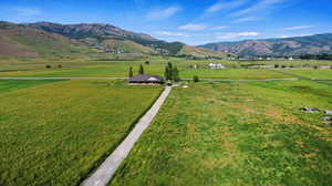 Property view of mountains with a rural view