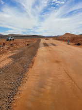 View of street with a rural view and a mountain view