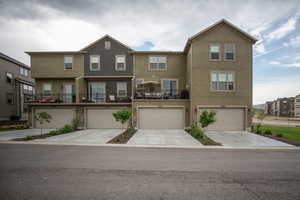 View of property featuring a garage