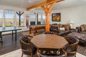Game room featuring pool table and hardwood / wood-style flooring