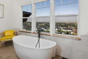 Bathroom with tile patterned flooring