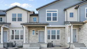 View of property featuring central AC unit