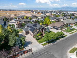 Birds eye view of property with a mountain view