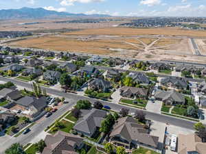 Birds eye view of property with a mountain view