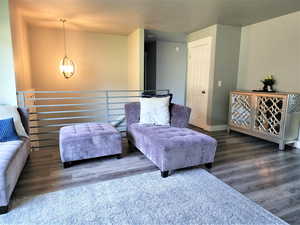 Interior space featuring a notable chandelier and hardwood / wood-style floors