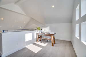 Interior space with lofted ceiling with beams