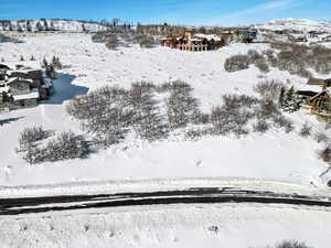 Snowy aerial view with a mountain view