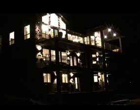 View of property exterior at night