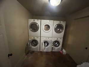 Laundry room with stacked washer / drying machine