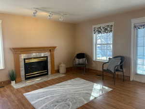 Living area featuring a fireplace and light hardwood / wood-style floors