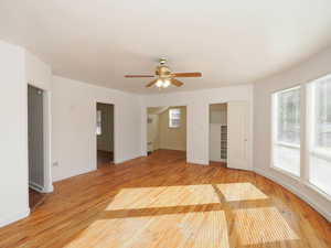 Empty room featuring light hardwood / wood-style floors and ceiling fan