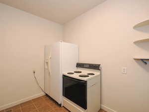 Kitchen with white appliances