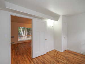 Interior space with hardwood / wood-style flooring