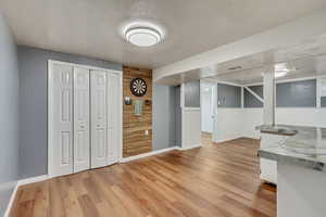 Basement has a bedroom area and bonus room which can be used as a walk-in closet/storage