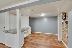 Basement has a bedroom area and bonus room which can be used as a walk-in closet/storage