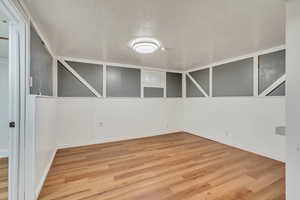 Basement has a bedroom area and bonus room which can be used as a walk-in closet/storage