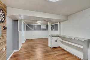 Basement has a bedroom area and bonus room which can be used as a walk-in closet/storage