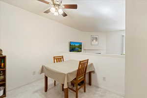 Dining space featuring ceiling fan and billiards