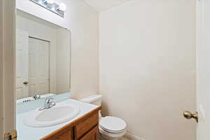 Bathroom with vanity and toilet