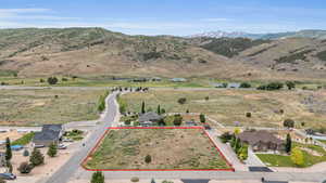 Drone / aerial view featuring a mountain view