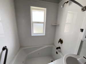 Bathroom with shower / bath combination