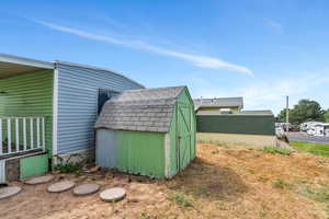 Exterior space with a shed