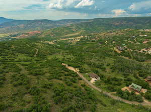 Birds eye view of property featuring a mountain view