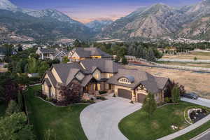 Aerial view at dusk featuring a mountain view