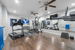 Gym featuring hardwood / wood-style floors and ceiling fan