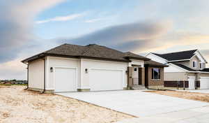 View of front facade with a garage