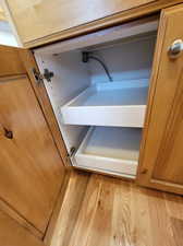 Roll out shelves in large kitchen island.