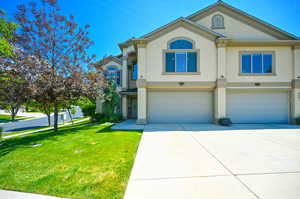 Front view of Twin home. One two car garage.