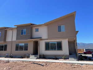 View of front of home with a mountain view