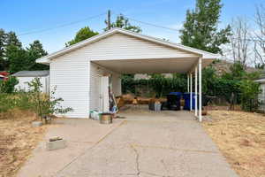 Exterior space with a carport