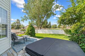 Exterior space featuring a patio and a yard