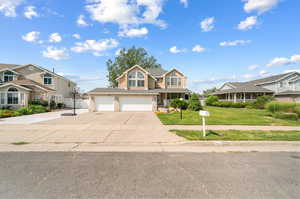 View of front of property with a garage