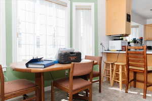 Dining room featuring light tile patterned floors