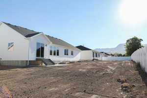 Back of house with a mountain view