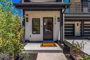 Property entrance featuring a garage