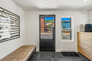 Entrance foyer featuring tile patterned flooring and a wealth of natural light