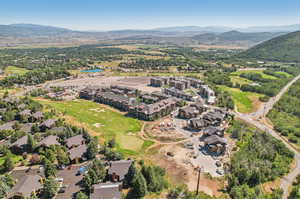 Birds eye view of property featuring a mountain view