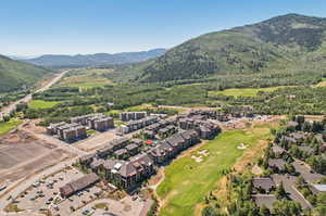 Birds eye view of property with a mountain view