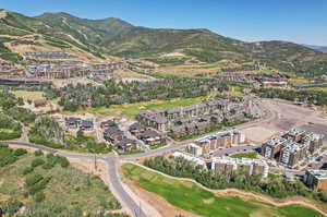 Birds eye view of property with a mountain view