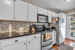 Painted White Cabinets & Stylish Backsplash