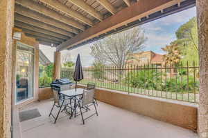 Main Covered Patio next to pond and stream