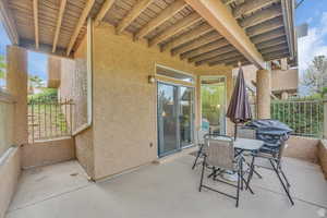 Main Covered Patio next to pond and stream 2