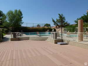 Pool deck adjoining pool and spa