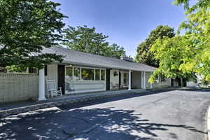 Single story home with a porch