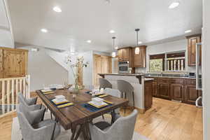 Dining room with light wood-type flooring