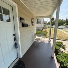 View of patio with covered porch